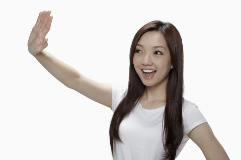woman waving