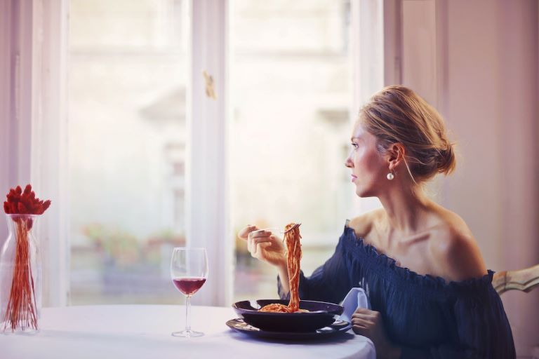 woman eating alone